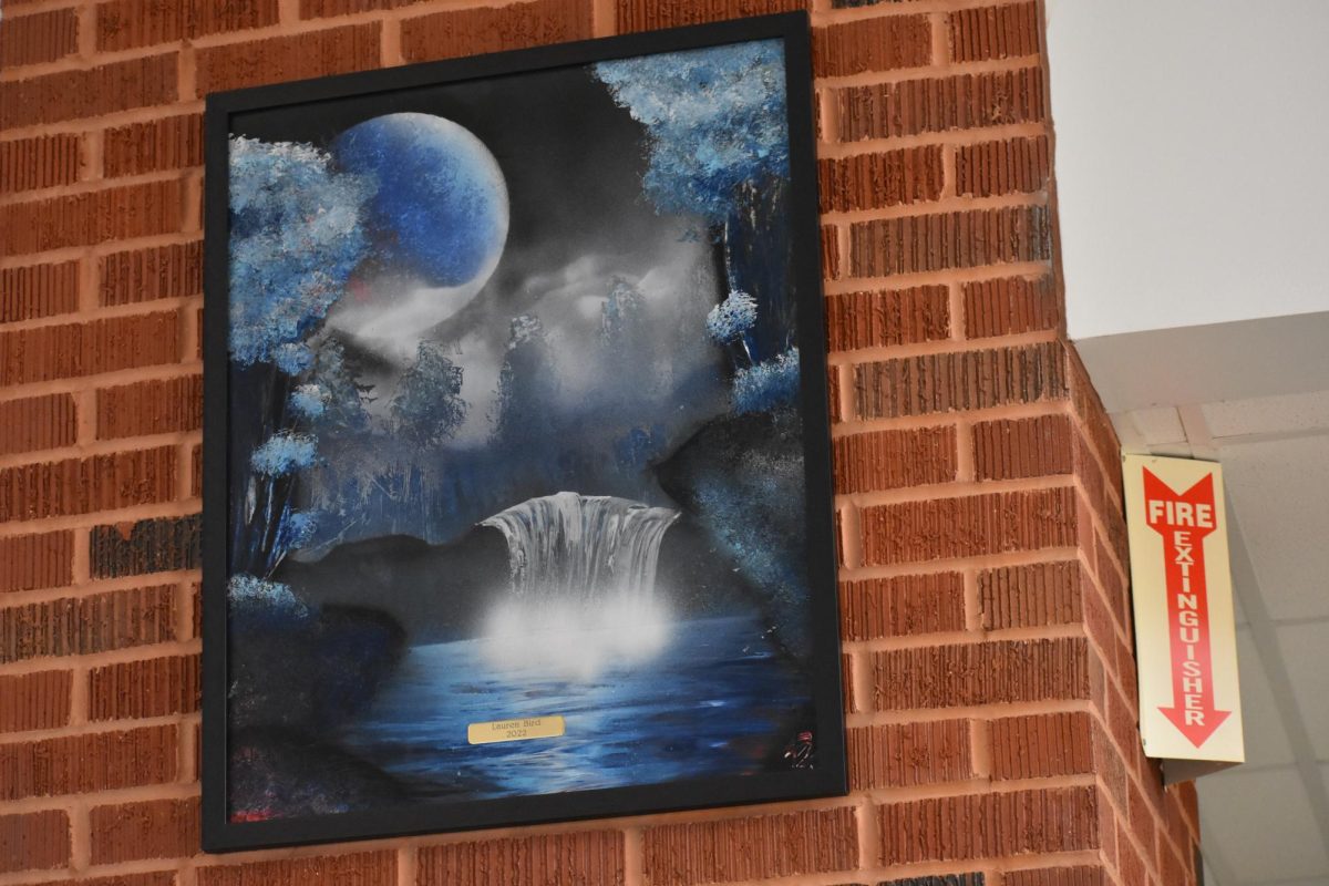 Pictures and paintings are hung around the school of Amherst, showing off wonderful decorations.