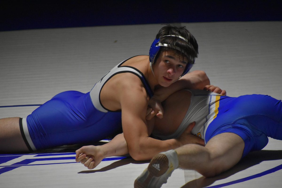 Wrestlers Grapple at Conference Meet; Advance to Sectionals